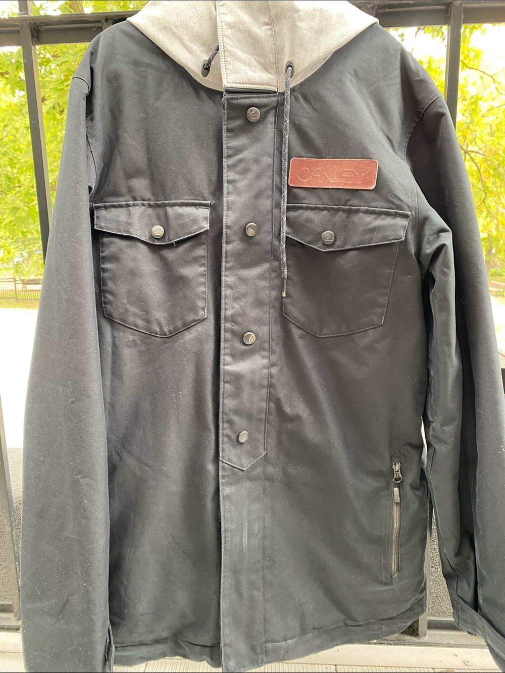 Oakley Black Jacket with Light Gray Hood and Brown Chest Patch